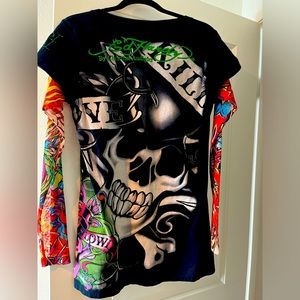 Excellent !! Fit a medium size - long sleeve sheer design shirt - Rocket 🚀